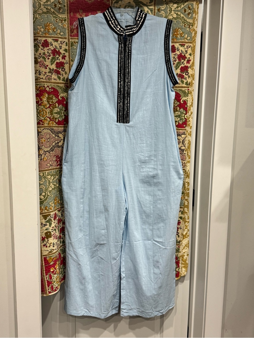 Sleeveless Light Blue Linen Jumpsuit with Contrast Trim and half zipper